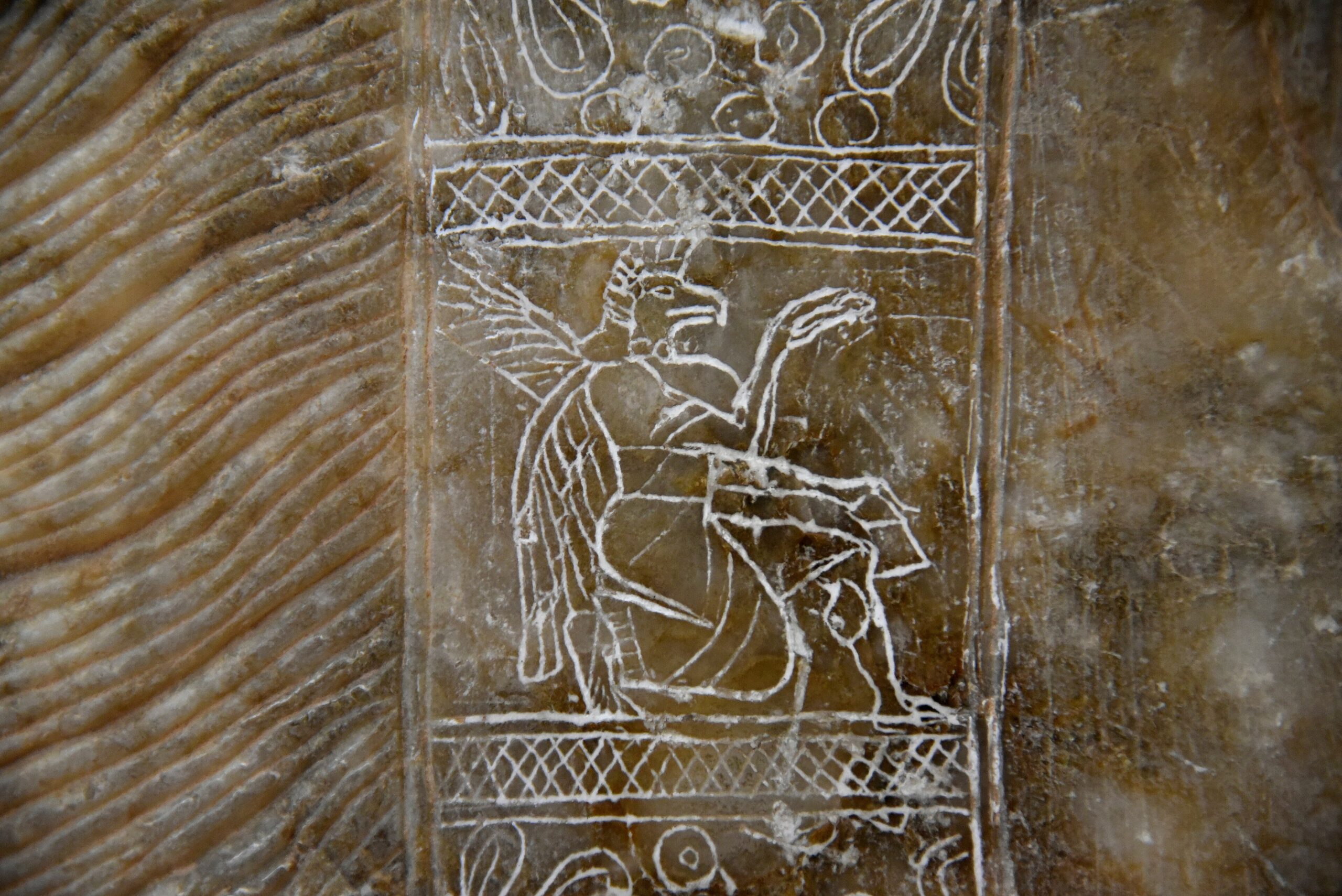 Our only depiction of a kneeling Apkalu-sage with pinecone and handbag as he would have appeared in tamarisk figurine form. Depiction of a kneeling vulture apkallu; Kalḫu, Northwest Palace of Aššur­naṣirpal II; Neo-Assyrian (9th cent. bc); bas-relief on a limestone orthostat. Eski Şark Eserleri Müzesi, Istanbul, EŞEM 7036. Photograph: Osama Shukir Muhammed Amin.